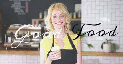 Smiling woman with coffee cup in home kitchen atmosphere