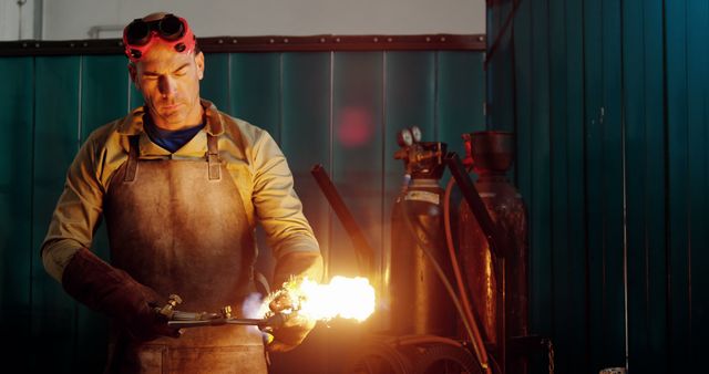 Expert Blacksmith Using Blowtorch in Workshop - Download Free Stock Images Pikwizard.com