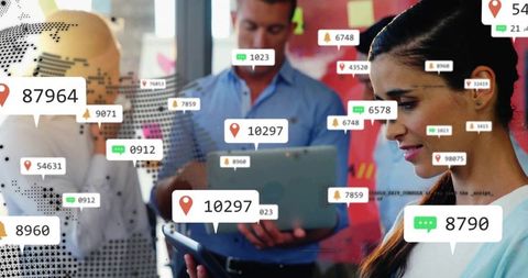 Professional Team Analyzing Digital Location Data in Modern Office