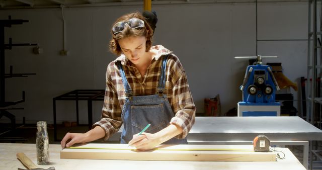 Woman Measuring Wood in Workshop for Precision Craftsmanship - Download Free Stock Images Pikwizard.com