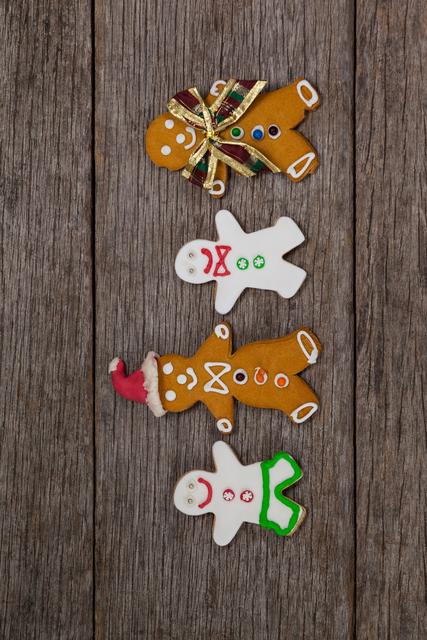 Various types of gingerbread arranged together on a plank