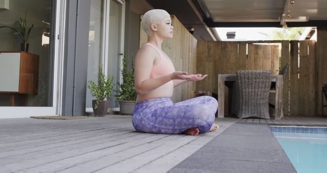 Young Woman Practicing Yoga Near Poolside in Modern Home - Download Free Stock Images Pikwizard.com