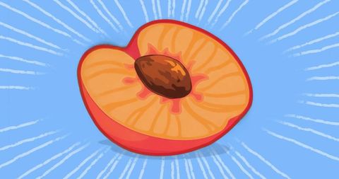 Vibrant halved peach with pit against blue background