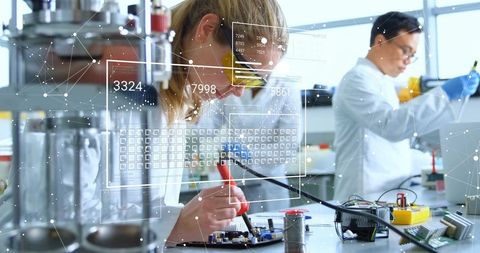 Scientists Analyzing Data in Advanced Lab with Digital Overlay Concepts - Download Free Stock Images Pikwizard.com