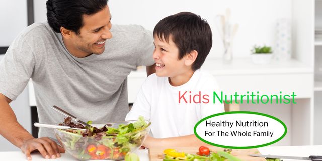 Father and Son Enjoying Healthy Salad Together in Kitchen - Download Free Stock Templates Pikwizard.com