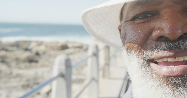 Smiling Elderly Man with White Beard at a Seaside - Download Free Stock Images Pikwizard.com