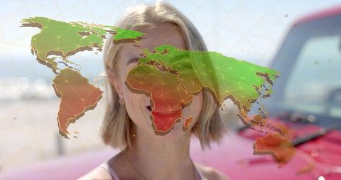World Map Overlay on Woman by Beach Connects Tech and Travel