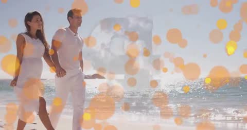 Romantic Couple Walking By Ocean With Bokeh Effect