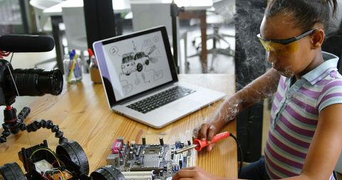 Teen Girl Soldering Circuit Board for Technical Project - Download Free Stock Images Pikwizard.com