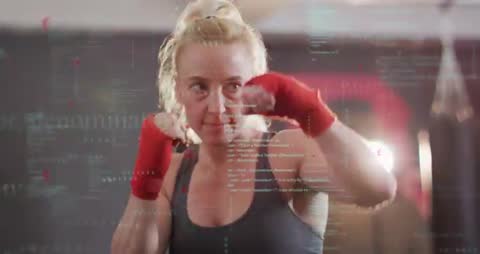 Female Boxer Throwing Jab-Cross with Augmented Data Overlay for Training Analysis