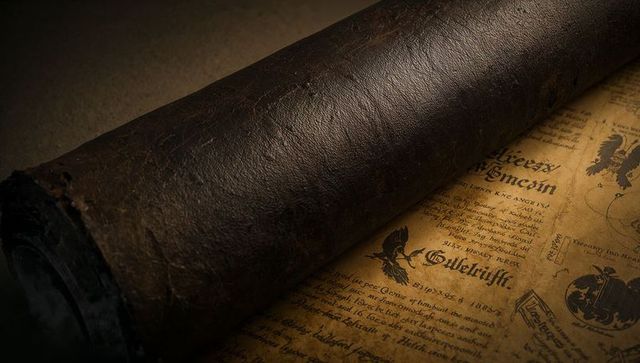 Unfurling dark leather scroll revealing aged parchment with gothic script and sepia tones