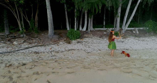 Hula Dancer Performing Alone on Secluded Beach at Twilight - Download Free Stock Images Pikwizard.com
