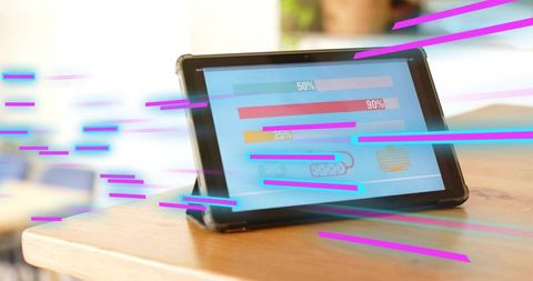 Tablet showing neon glitch progress bars and percent labels on wooden cafe table