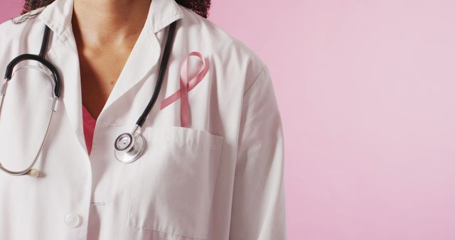 Close-Up of Female Doctor with Pink Ribbon and Stethoscope on Breast Cancer Awareness - Download Free Stock Images Pikwizard.com