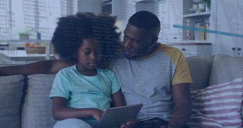 Parent and Child Learning Together on Tablet with Digital Code Overlay, Home Learning