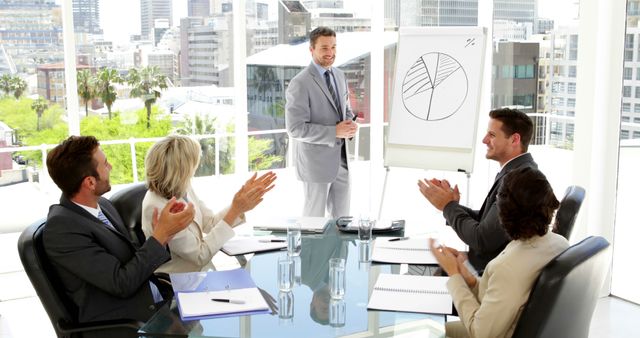 Business Team Clapping for Presentation in Modern Office - Download Free Stock Images Pikwizard.com
