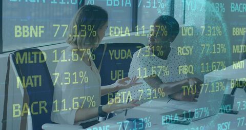 Businesswomen Analyzing Financial Data with Transparent Stock Numbers - Download Free Stock Images Pikwizard.com