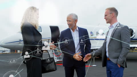 Business Professionals Networking at Private Jet Terminal