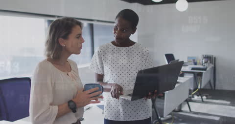 Diverse Business Colleagues Analyzing Digital Financial Data
