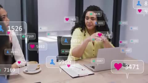 Business Team Analyzing Social Media Engagement in Modern Office