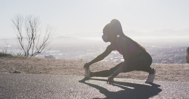 Woman Stretching in Urban Outdoor Setting - Download Free Stock Images Pikwizard.com