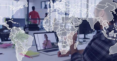 Remote video meeting in open office with global map overlay for international teamwork