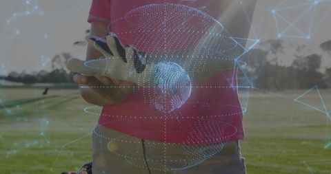 Mature female golfer adjusting glove with holographic globe overlay on fairway