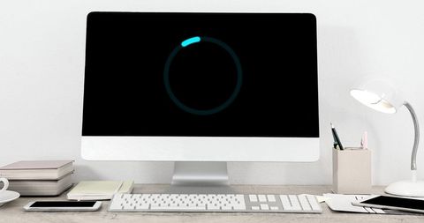 Minimalist Workspace with Loading Screen Illumination - Download Free Stock Images Pikwizard.com