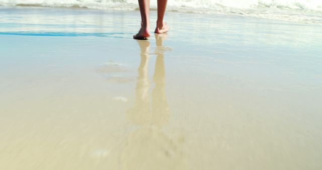 Man walking on the beach on a sunny day 4k - Download Free Stock Photos Pikwizard.com