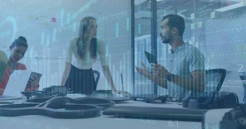 Collaborative teamwork and stock market analysis in modern office