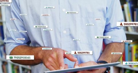 Businessman Analyzing Social Media Data on Tablet in Modern Office