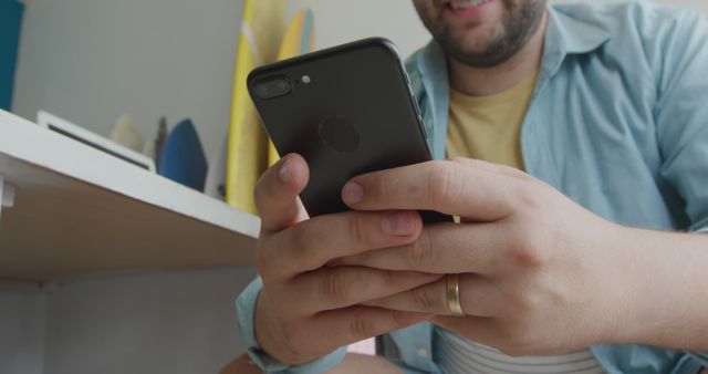 Close-Up of Bearded Man Using Black Smartphone - Download Free Stock Images Pikwizard.com