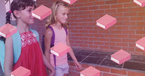 Two Schoolgirls Walking in Corridor with Overlayed Books Graphics