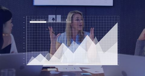 Businesswoman Analyzing Data with Graph Overlay in Meeting