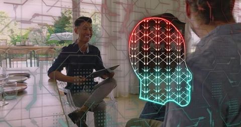 Asian professional presenting holographic neural head display in modern workspace
