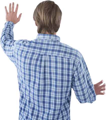 Rear view of man in blue plaid shirt using transparent interface
