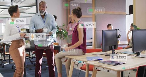 Multiple employees of diverse ethnicities seen interacting in a contemporary office environment with digital notifications superimposed, indicating social media activity and connectivity. Ideal for illustrating concepts related to digital interaction, workplace communication, and collaborative office culture.