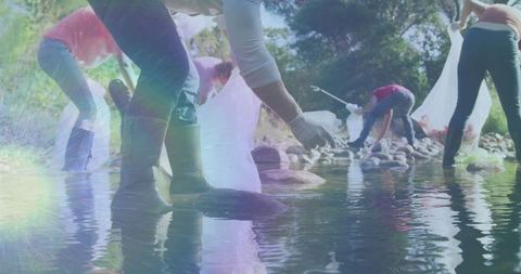 Environmental Volunteers Collecting Litter in River - Download Free Stock Images Pikwizard.com