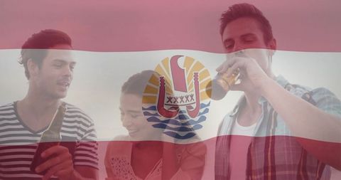 Friends Enjoying Drinks at Beach Party With Tropical Flag Overlay