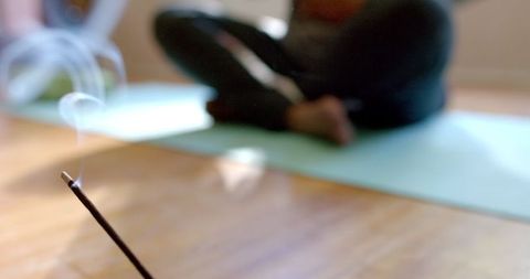 Tranquil Meditation with Incense in Cozy Home Atmosphere