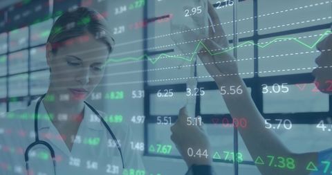 Medical professionals analyzing financial reports for healthcare insights