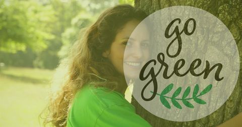 Sustainable living concept woman hugging tree go green message