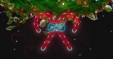 Festive candy cane and heart design on black background