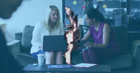 Businesswomen collaborate with cloud computing concept in office