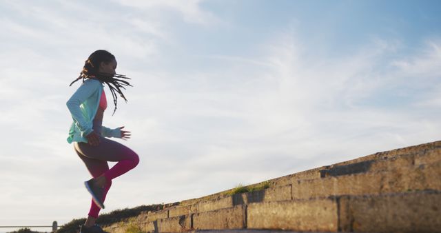 Young Woman Running Upstairs Outdoors During Sunrise - Download Free Stock Images Pikwizard.com