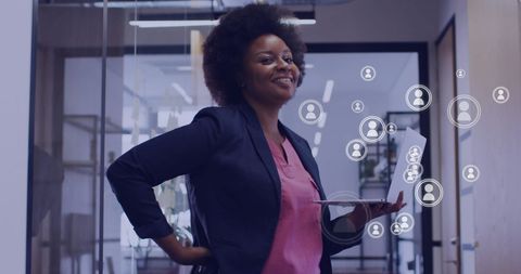 Confident Businesswoman Leveraging Digital Connections in Modern Office