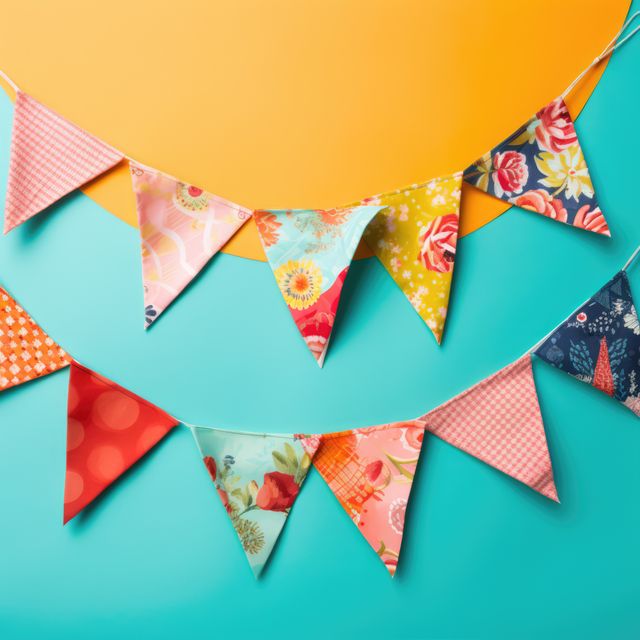 Bright and cheerful bunting flags hanging against a vibrant turquoise and yellow background. Perfect for party decorations, festive events, and celebration themes. Great for invites, banners, and social media posts promoting joyful occasions.