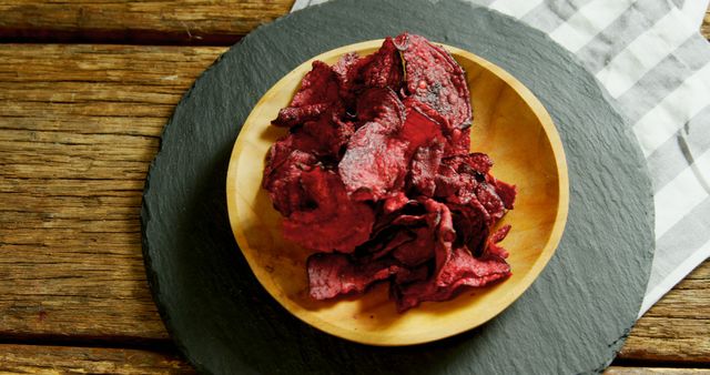 Crunchy Beet Chips in Wooden Bowl on Rustic Wooden Table - Download Free Stock Images Pikwizard.com