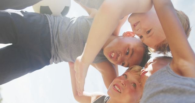 Group of Boys Huddling with Soccer Ball at Daytime - Download Free Stock Images Pikwizard.com