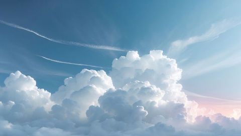 Majestic Cumulus Clouds in Blue Sky with Contrails